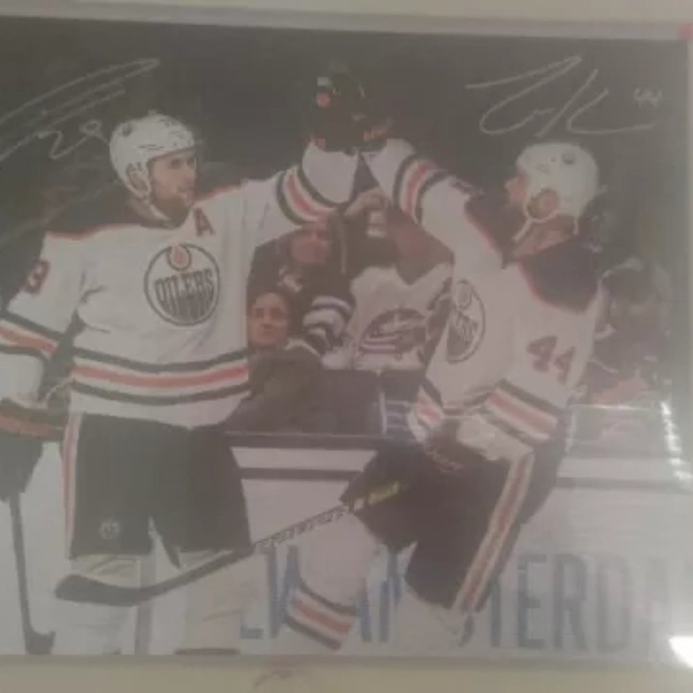 Leon and kass signed photo